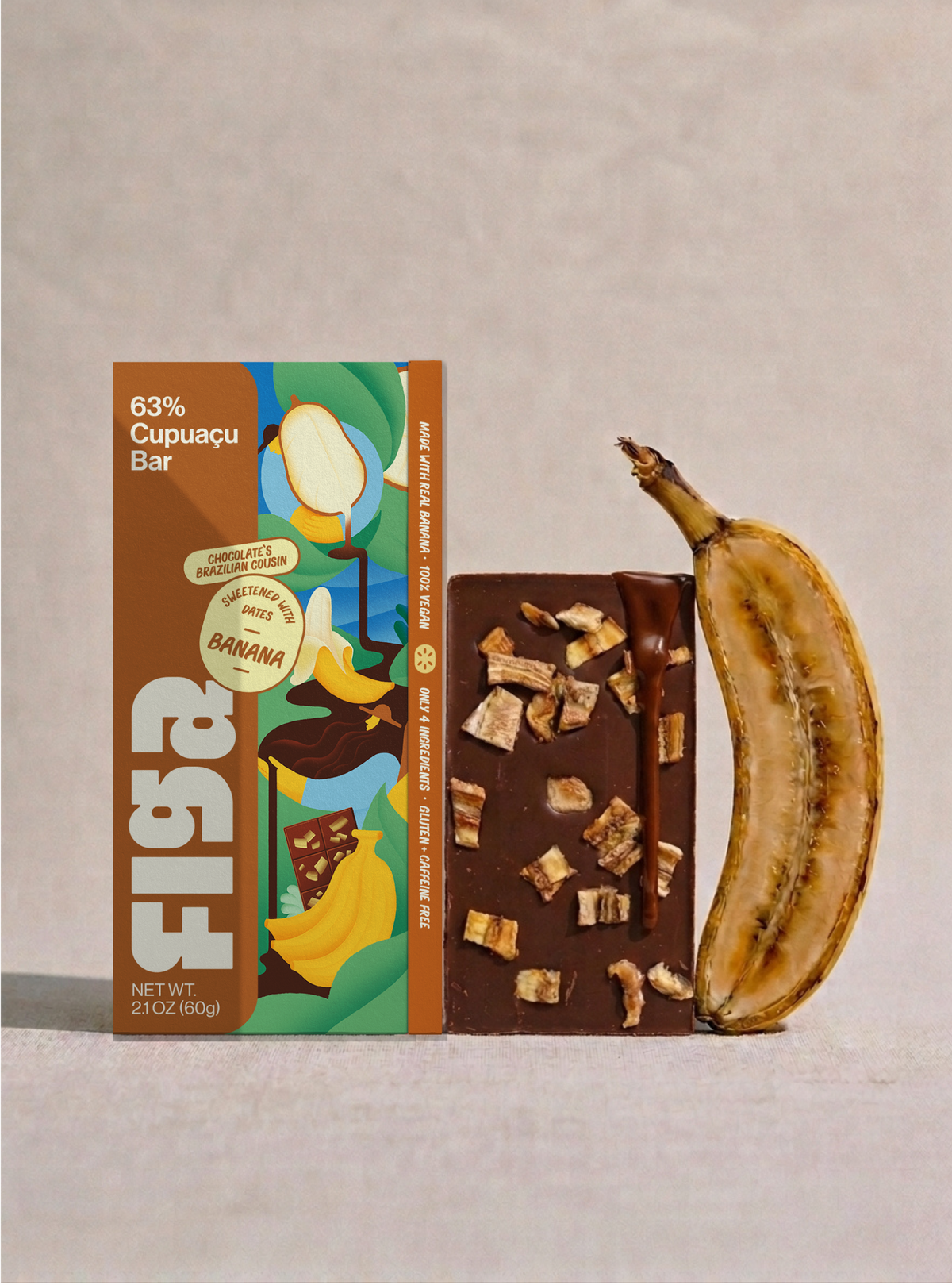 A Figa 63% Cupuaçu Bar chocolate bar topped with banana shown with its illustrated Brazilian inspired packaging and a whole banana beside it on a neutral beige background.